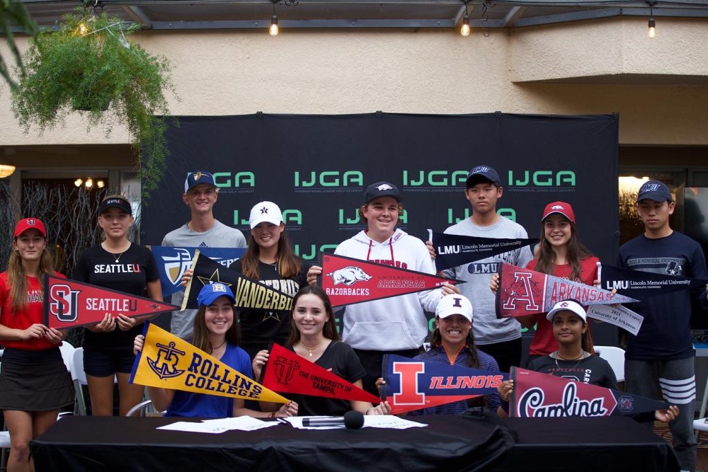 IJGA College Signers Class of 2021 holding college pennants